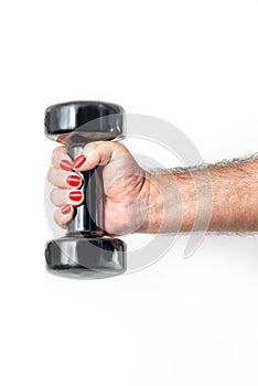 Male hand with red fingernails holding dumbbell