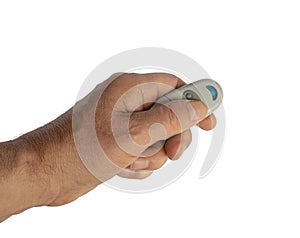 a male hand with the remote control isolated photo