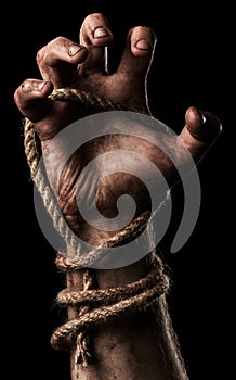 Male hand with rope. Conception aggression