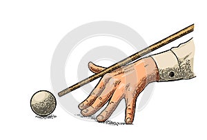 Male hand in a shirt is aimed cue the ball.