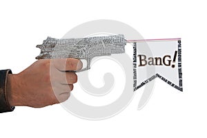 Male hand with shoting newspaper pistol and flag