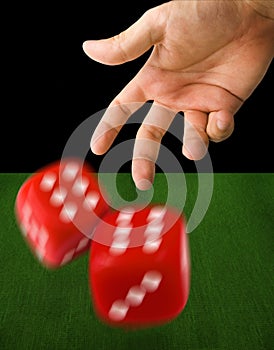 Male Hand Throwing Dice