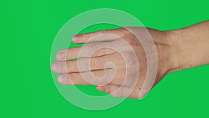 Male hand touching, clicking, tapping, sliding and swiping on chroma key green screen background. Different signs and