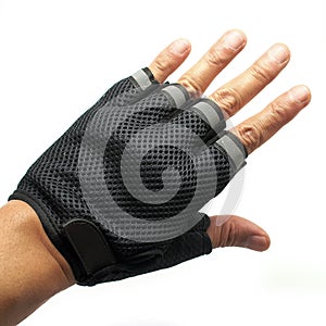 Male hand wearing cycling gloves