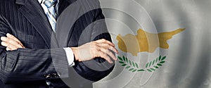 Male hands against Cypriot flag background, business, politics and education in Cyprus concept