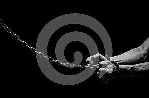 Male hands chained.
