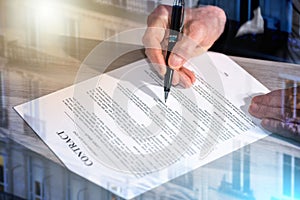 Male hands checking contract; multiple exposure
