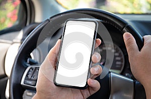 male hands hold phone with  screen background steering wheel