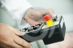 Pushing the button on the control panel