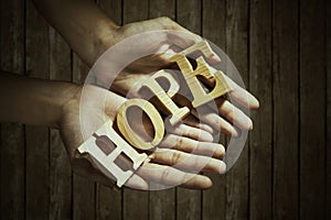 Male hands holding hope