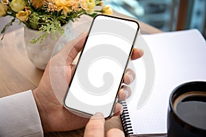 male hands holding phone with isolated screen background office