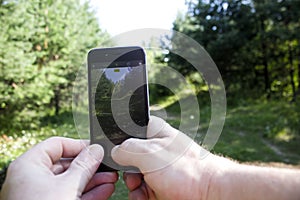 Male hands holding a smartphone