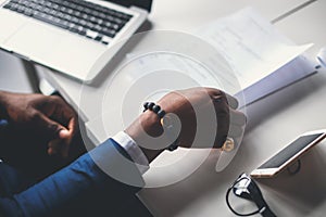 Male hands with pen over document