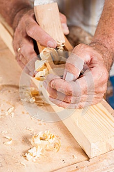 Male hands with plane