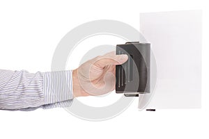 Male hands punching paper