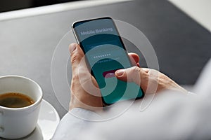 Male hands using mobile banking