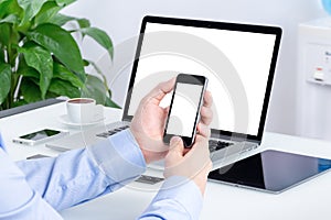 Male hands using smartphone mockup at the office desk