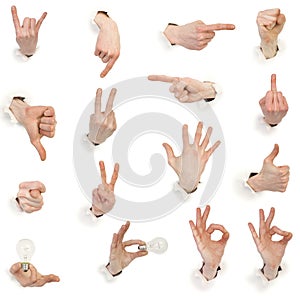Male hands through white paper