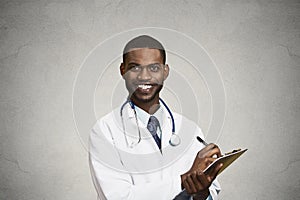 Male health care professional, doctor taking patient notes