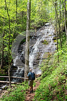 Male hiker enjoying Little Creek Falls on Coopers Creek in North Carolina.