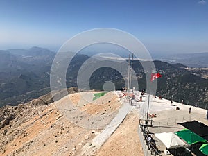 Male hiker on a hiking trail in a remote region of the nature reserve in the Judaean Desert. Panoramic desert landscape of