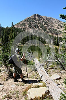 Male hiker by river