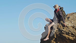 Male hiker walks in mountains