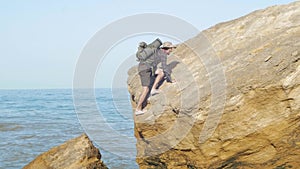 Male hiker walks in mountains