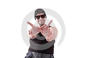 Male hip-hop dancer posing in the Studio. Isolated on white background .