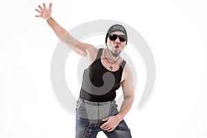 Male hip-hop dancer posing in the Studio. Isolated on white background .