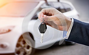 Male holding car keys