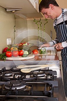 Male in home kitchen