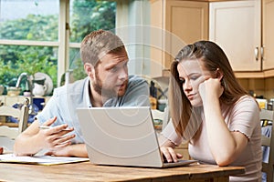 Male Home Tutor Helping Girl Struggling With Studies photo