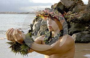 Male hula dancer`s dramatic expression.