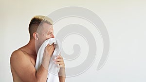 male hygiene bathroom routine shirtless man towel
