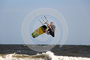 Male jumping kiteboard in Mui ne Vietnam