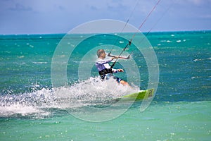 Male Kitesurfer turning hard