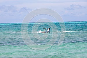 Male Kitesurfer turning hard