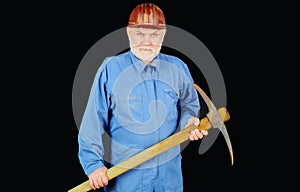 Male laborer with pickaxe. Construction worker, builder or miner with pickax. Mining industry.