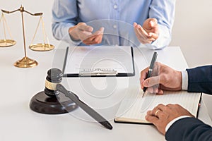 Male lawyer or judge consult with client check contract papers recommend legal proposals, Law services concept