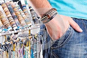 Male with leather bracelet