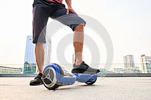 Male legs and gyroboard.