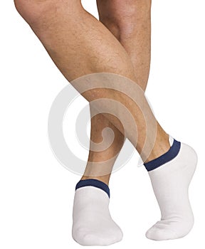 Male legs in socks. Isolated on white background
