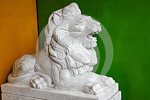 Male lion statue in China