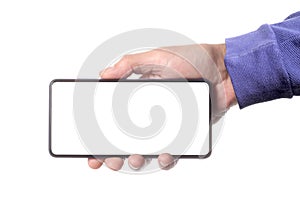 Male man holding and showing  blank smart phone isolated  on white background  with clipping path around hand and display with cop