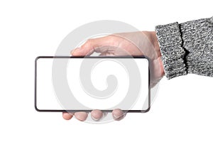 Male man holding and showing  blank smart phone isolated  on white background  with clipping path around hand and display with cop