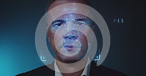 Male manager using face recognition system