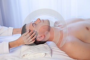 Male masseur doing Massage Spa health