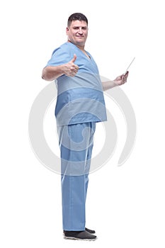 male medic with a digital tablet pointing at you.