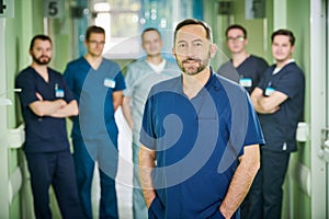 male medical doctors team in hospital hall